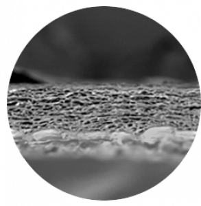 A black-and-white magnified cross-section image of a membrane's fibrous outer surface layer.
