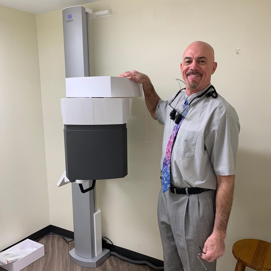 Practice team with their newly installed CBCT unit